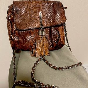 Crossbody purse, real python skin. Super comfy, has an inside and outside pocket